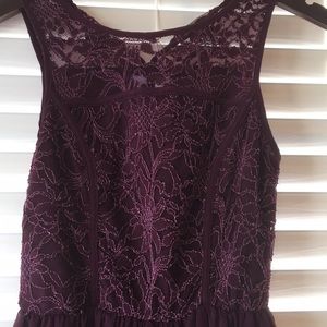 Francesca burgundy dress with lace details.